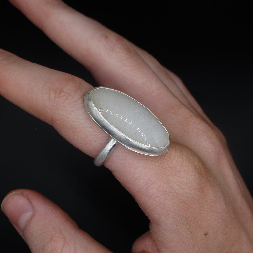 white oval ring