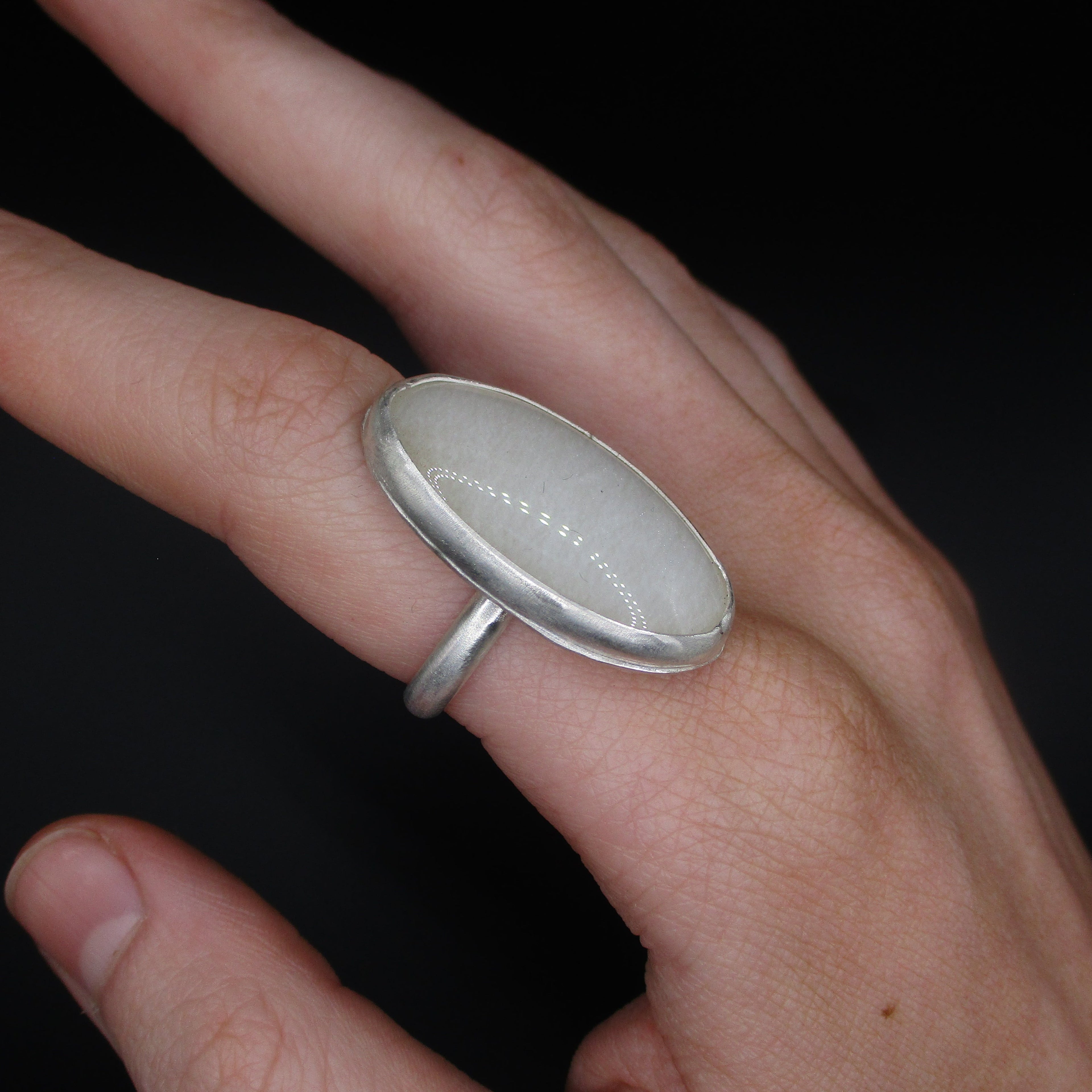 white oval ring