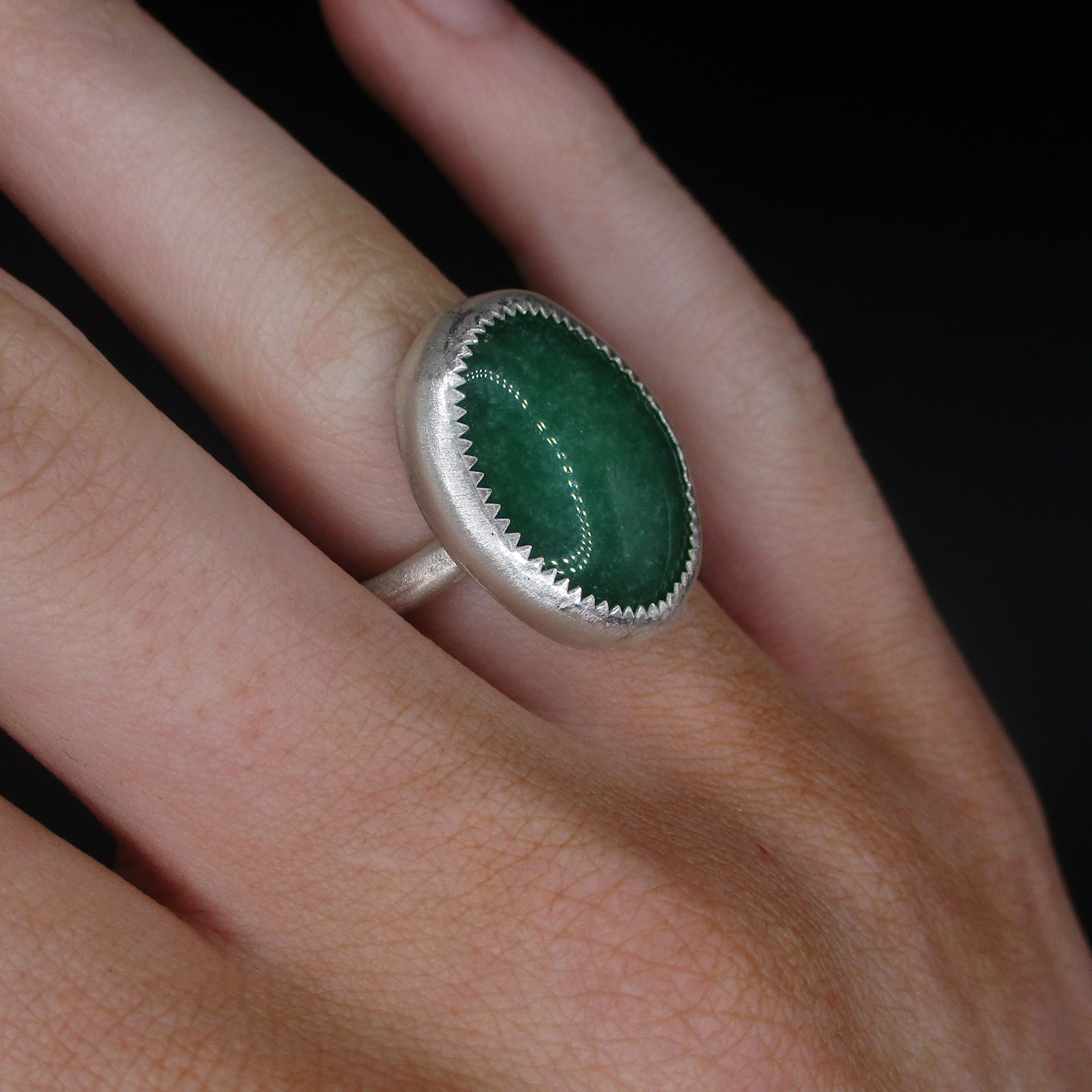 green oval ring