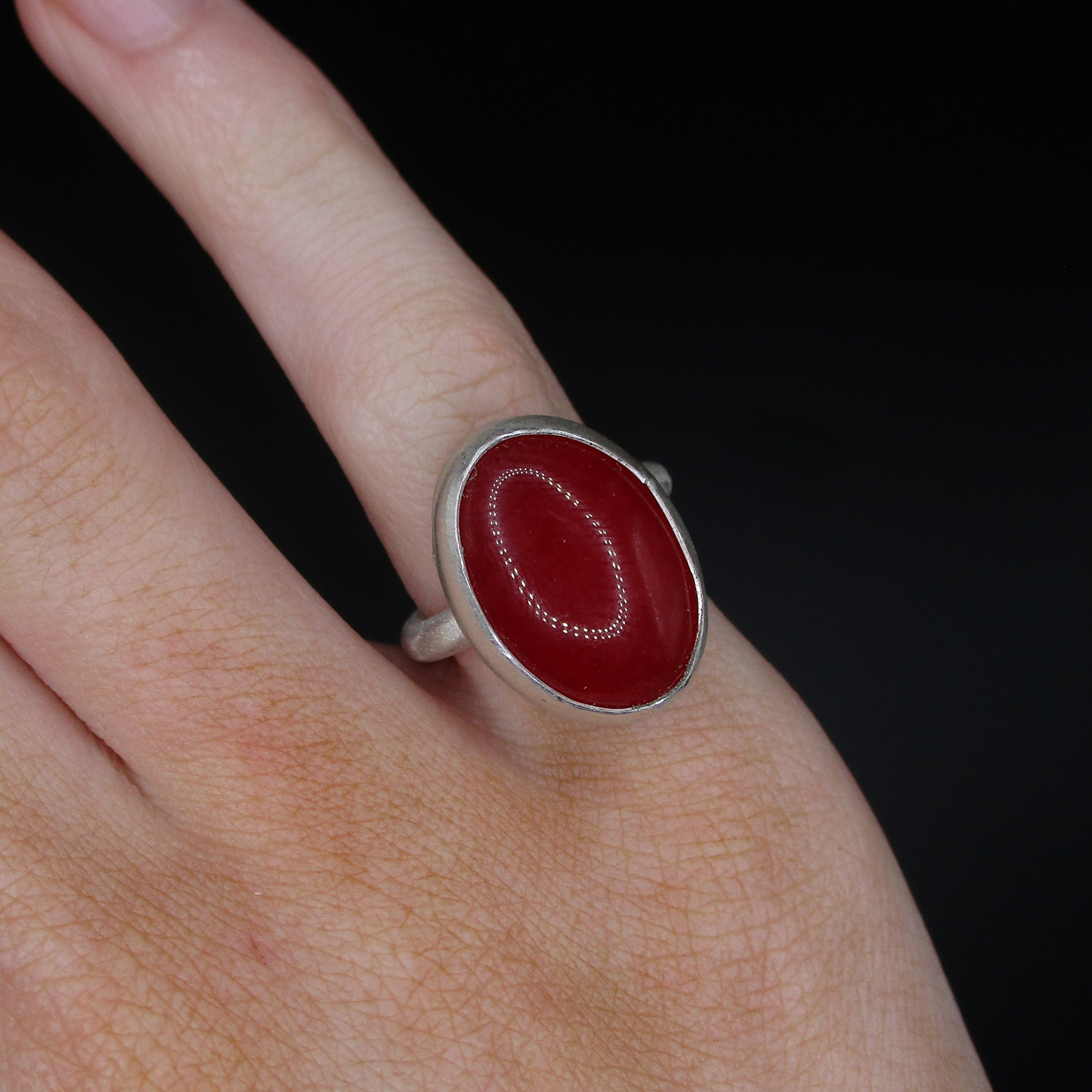 red oval ring